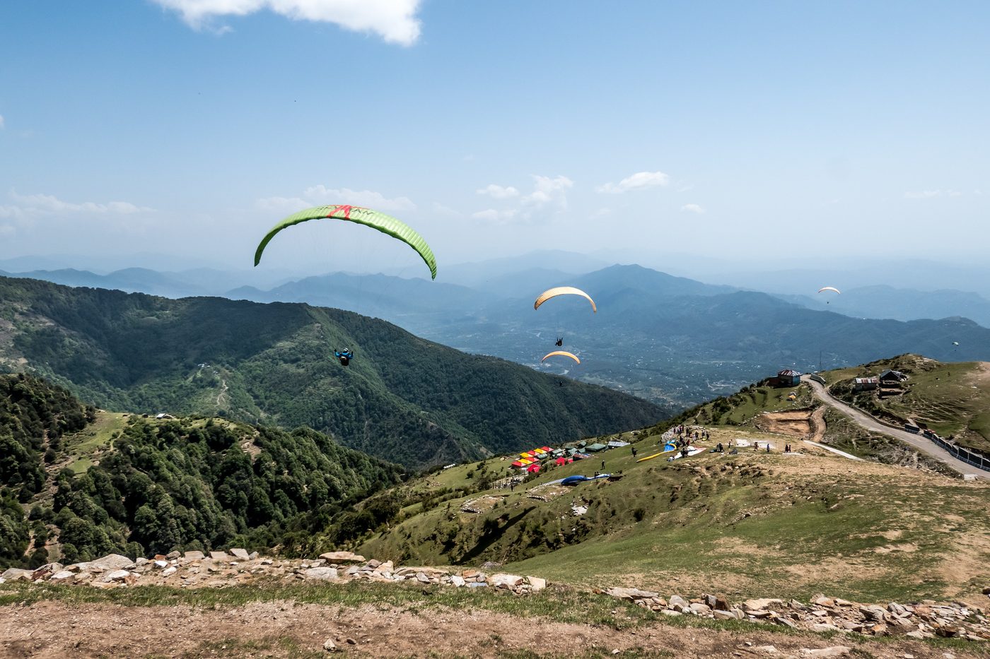 Wings in the air off the Billing launch, with the valley below