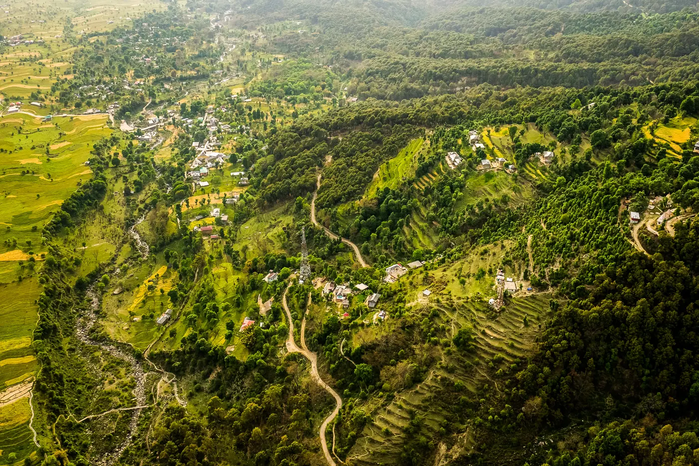 Terraced fields, a river and villages seen from the air
