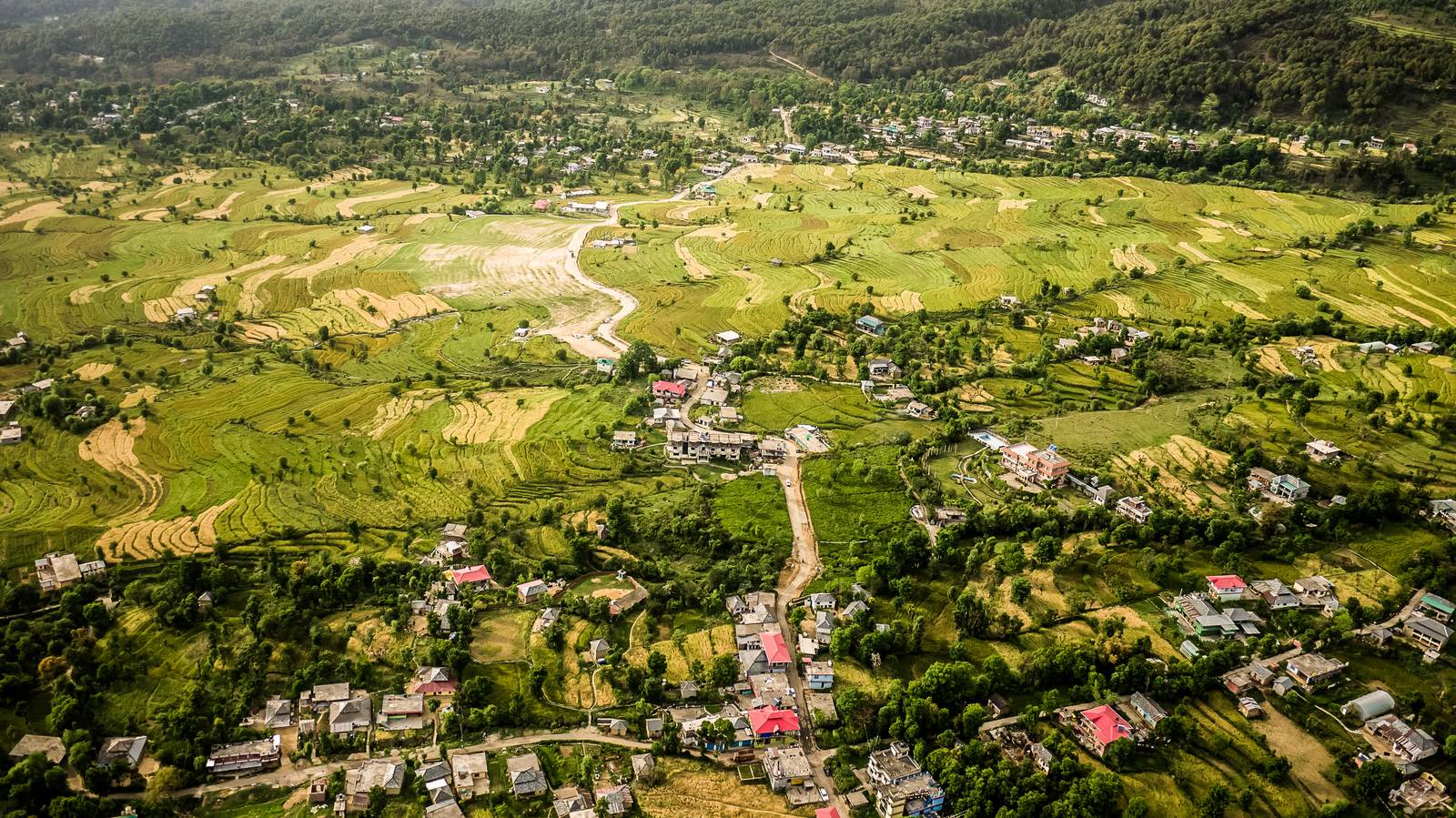 Bir's landing field among terraced fields, seen from the air